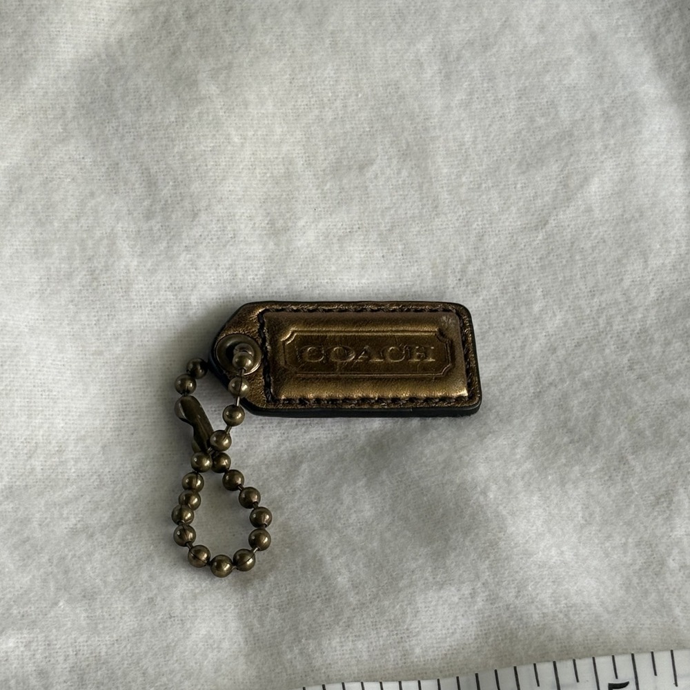 COACH 1.75" Hang Tag Fob Bag Charm Metallic Bronze Leather, Brass Ball Chain